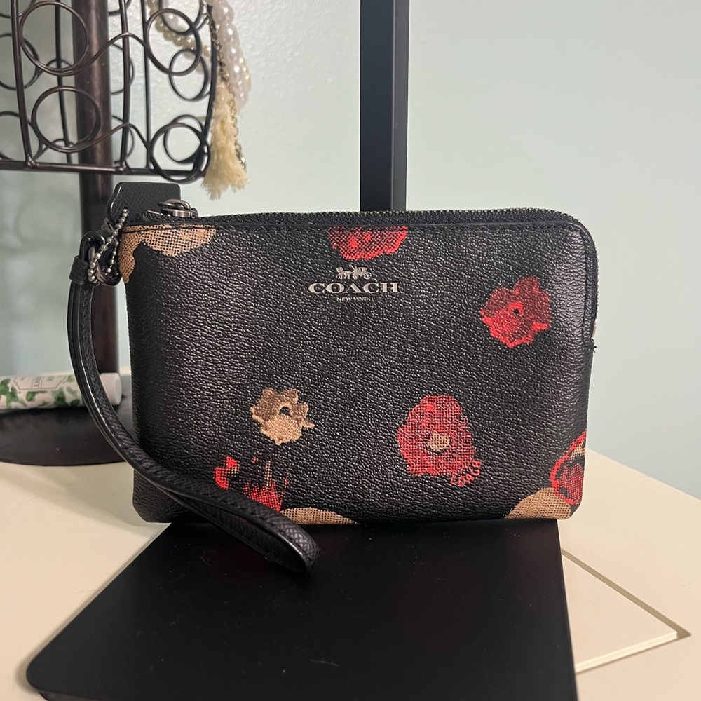 Coach Black Wristlet with Red and Beige Floral Accents